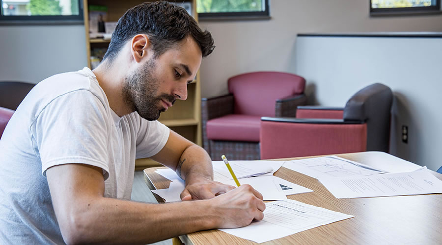 Student studying at a desk