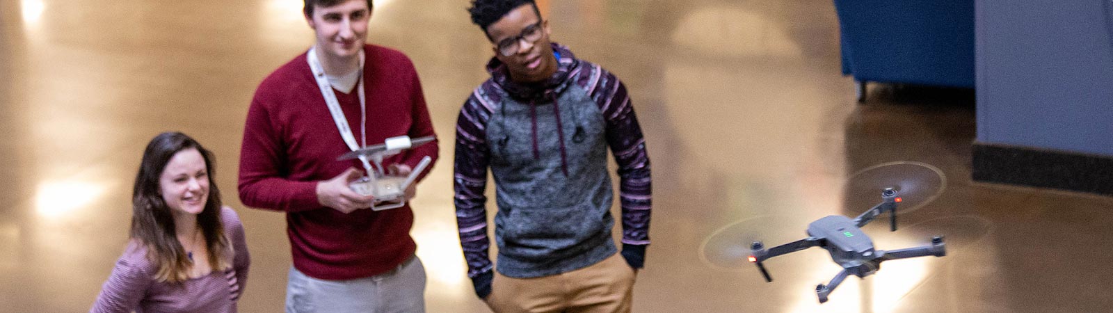 Students attending a aerial drone demonstration