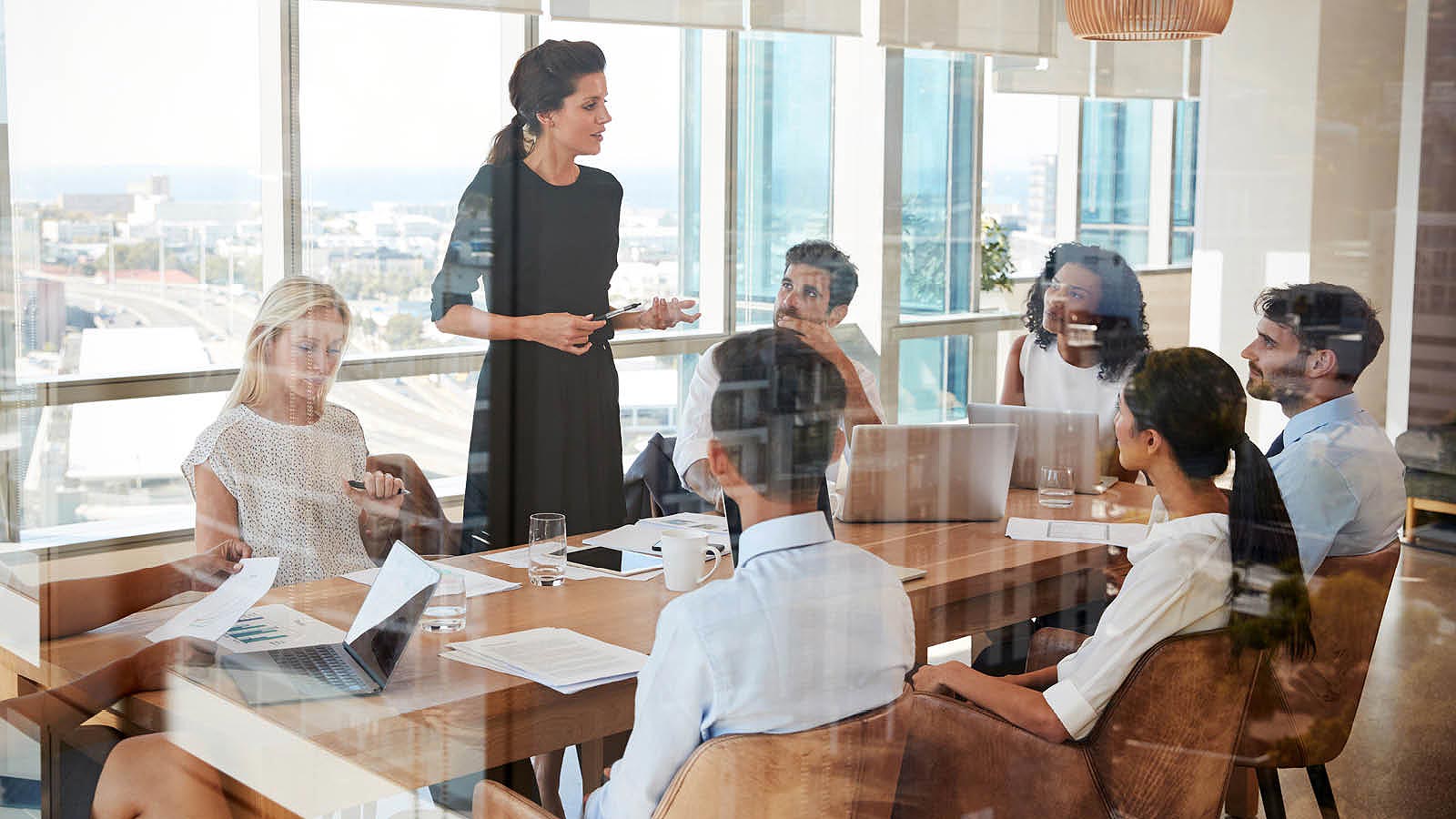 Orientation Session taking place at a conference room table